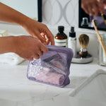 shadow: beauty essentials holding toiletries