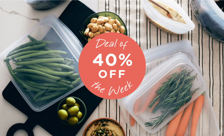 40% off deal of the week is live. image of stasher bags storing green beans, rosemary, and whole carrots