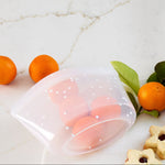 snow dots: 2-cup bowl with tangerines inside