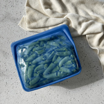 ocean forest: stand-up mid holding snap peas