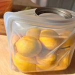 clear: stand-up mid holding lemons