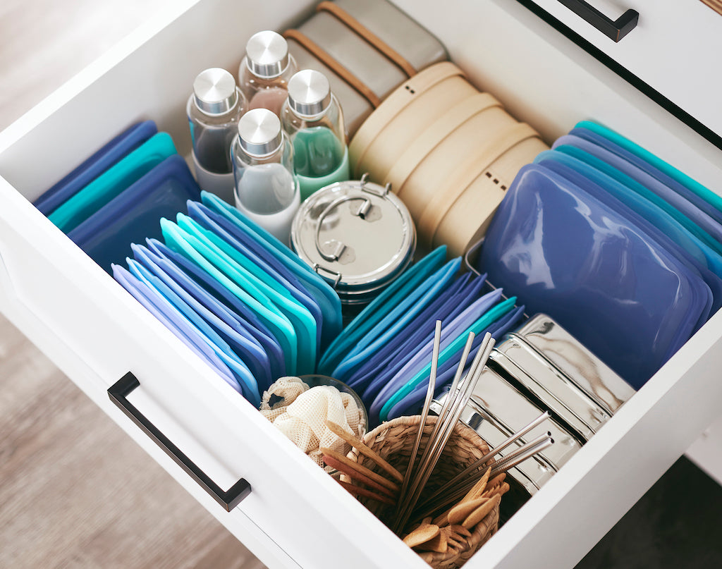 Eco drawer with reusable straws, bags, and water bottles