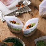 all: 2-cup bowls in clear holding quinoa salads. 