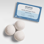 all: laundry hero with detergent sheets and wool balls. 