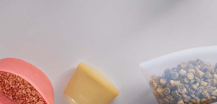REUSABLE SILICONE BOWLS. An easy-pour design and wide mouth mean bowls stay open for food prep and meals.