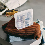 all: beauty essentials bag holding facial products