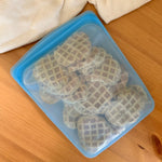 rainbow: half gallon in blue holding small waffles.