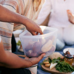 all: clear 8-cup bowl holding dinner rolls.