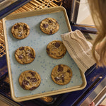 all: Stasher Baking Matt with chocolate chip cookies coming out of an oven.