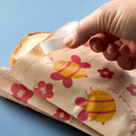 bee: paper sandwich bag with bee print close up. 