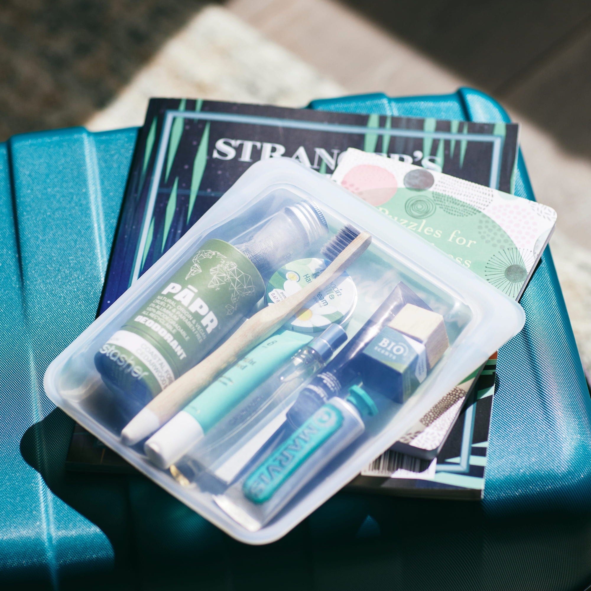 all: quart bag holding toiletries