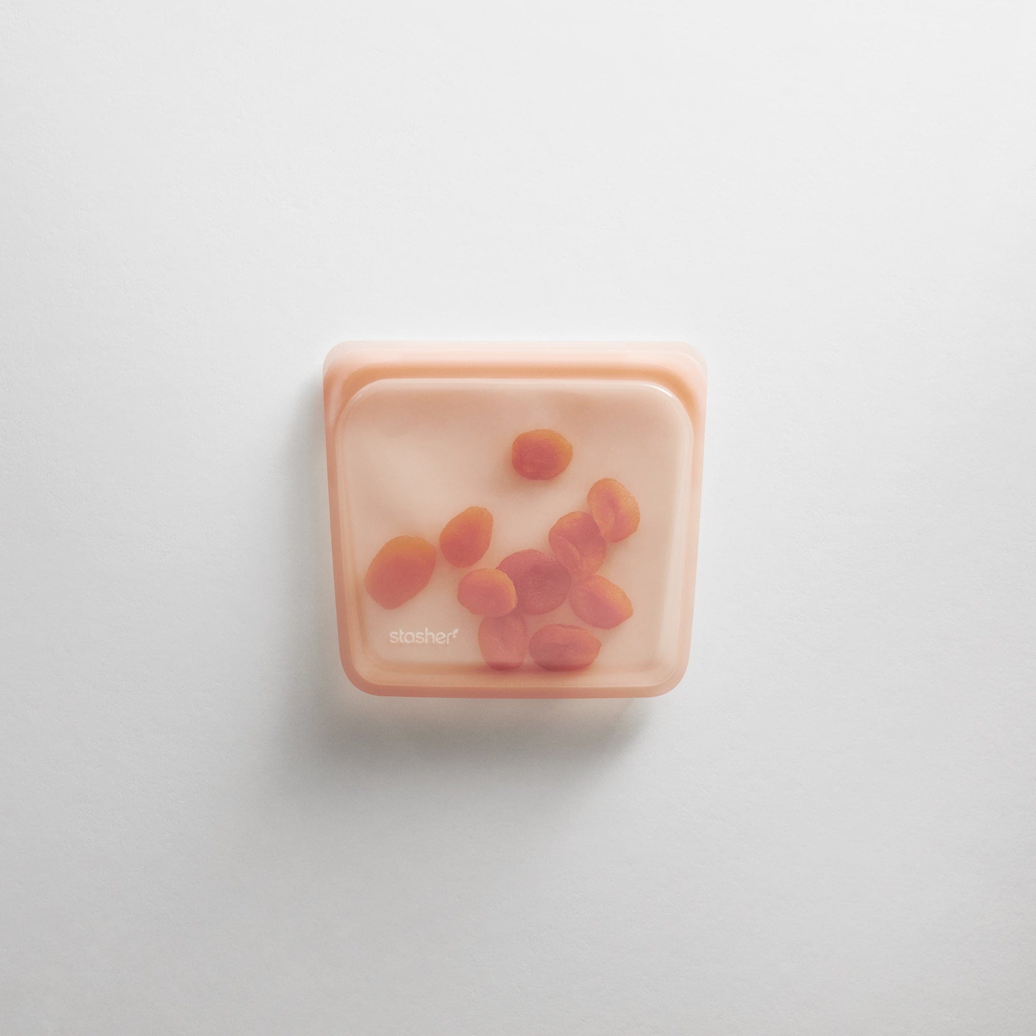 papaya: hero image of papaya sandwich holding dried apricots