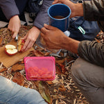all: raspberry sandwich holding oranges while camping. 