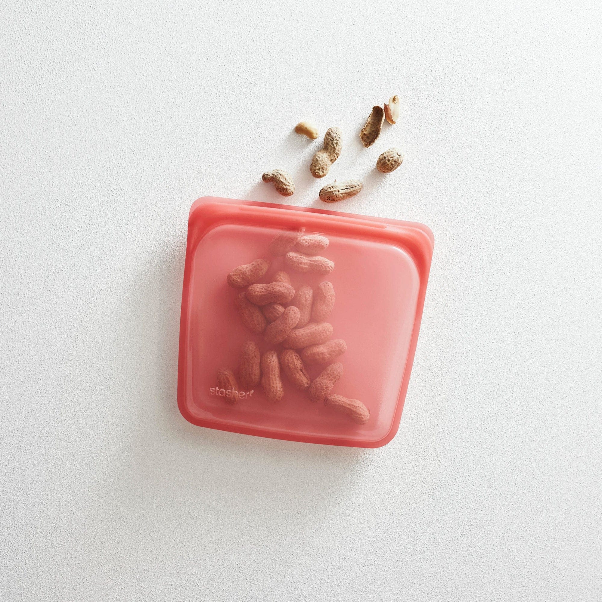 red: red sandwich bag hero image holding peanuts