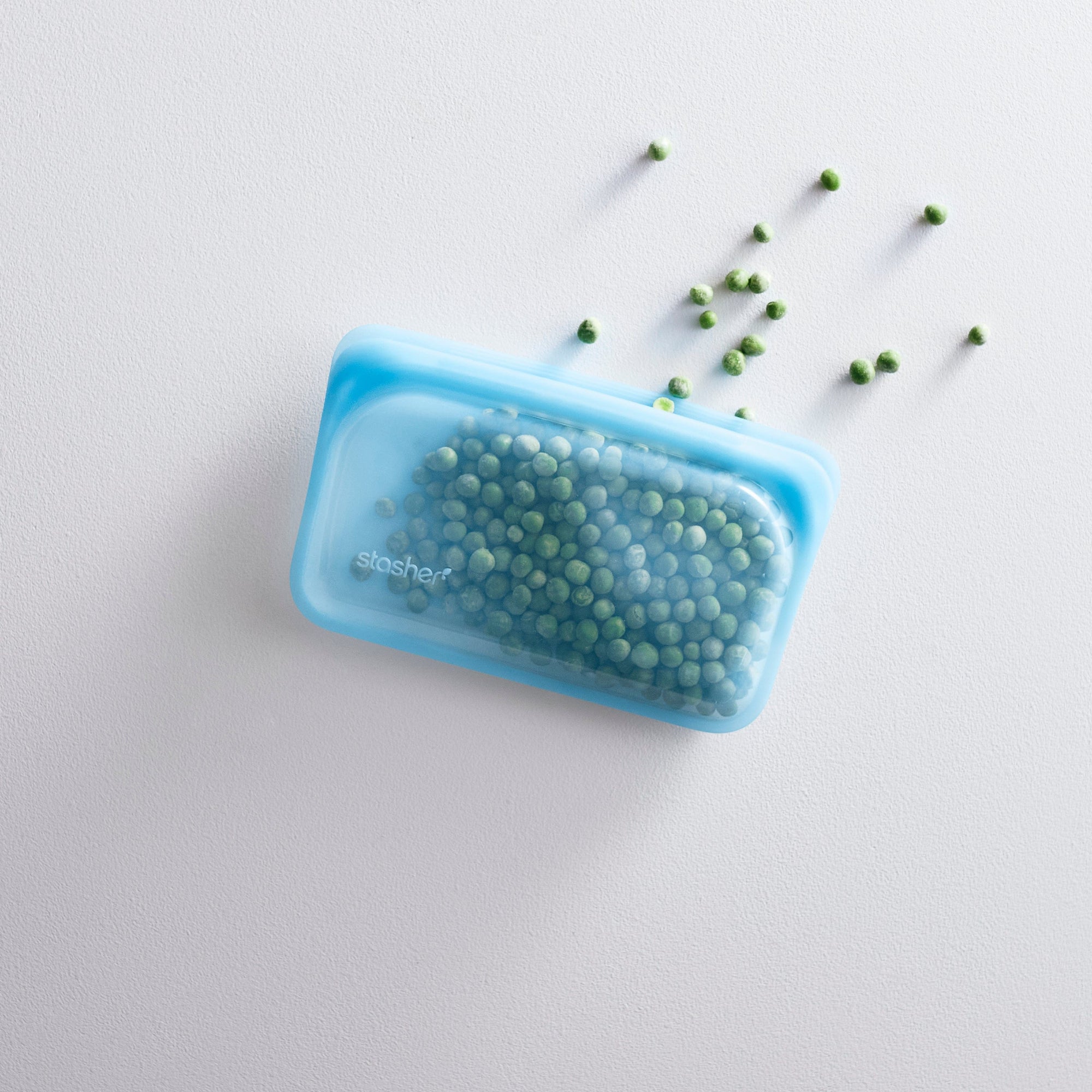 blue: snack bag in blue holding peas