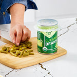 all: small stretch lids covering can of green beans