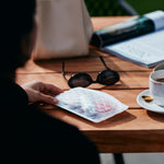 powder: beauty touch up bag holding mints and lip balm