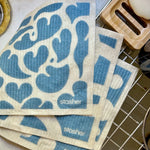 tide pool shapes: 3-pack of swedish dish cloths on a drying rack