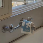 tide pool shapes: swedish dish cloth handing over sink 